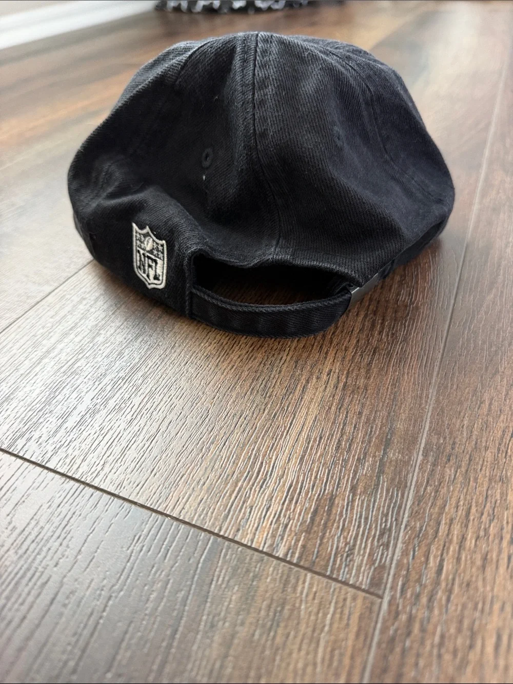 NFL Black Adjustable Hat with Embroidered Shield